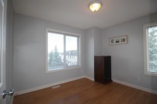 Photo 19: 27 Sandarac Villas NW in Calgary: Sandstone Valley Row/Townhouse for sale : MLS®# A1224690
