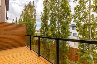 Photo 25: 404 Covecreek Circle NE in Calgary: Coventry Hills Row/Townhouse for sale : MLS®# A1217696