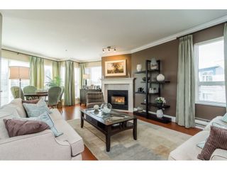 Photo 4: 404 20277 53 Avenue in Langley: Langley City Condo for sale in "Metro ll" : MLS®# R2249750