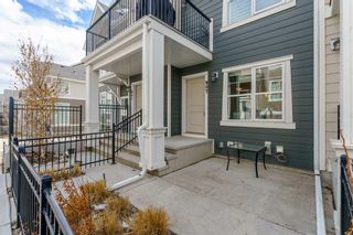 Photo 3: 907 Cranbrook Walk SE in Calgary: Cranston Row/Townhouse for sale : MLS®# A2125451