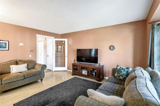 Photo 4: 30 River Rock Way SE in Calgary: Riverbend Detached for sale : MLS®# A2142143