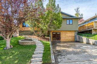 Photo 1: 735 Cantrell Drive SW in Calgary: Canyon Meadows Detached for sale : MLS®# A1240119