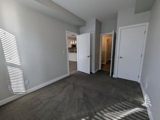 Photo 21: 1305 95 Burma Star Road SW in Calgary: Currie Barracks Apartment for sale : MLS®# A2049637