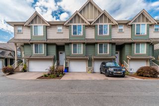 Photo 1: 59 6498 SOUTHDOWNE Place in Sardis: Sardis South Townhouse for sale in "HIGGINSON GARDENS" : MLS®# R2726027