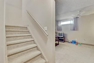 Photo 26: 8 15 Silver Springs Way NW: Airdrie Row/Townhouse for sale : MLS®# A1243983