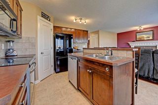 Photo 9: 784 LUXSTONE Landing SW: Airdrie House for sale : MLS®# C4160594