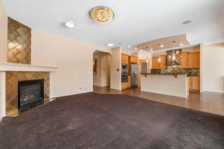 Photo 9: 677 Panatella Boulevard NW in Calgary: Panorama Hills Detached for sale : MLS®# A2107907