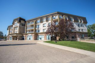 Photo 1: : Lacombe Apartment for sale : MLS®# A1143990