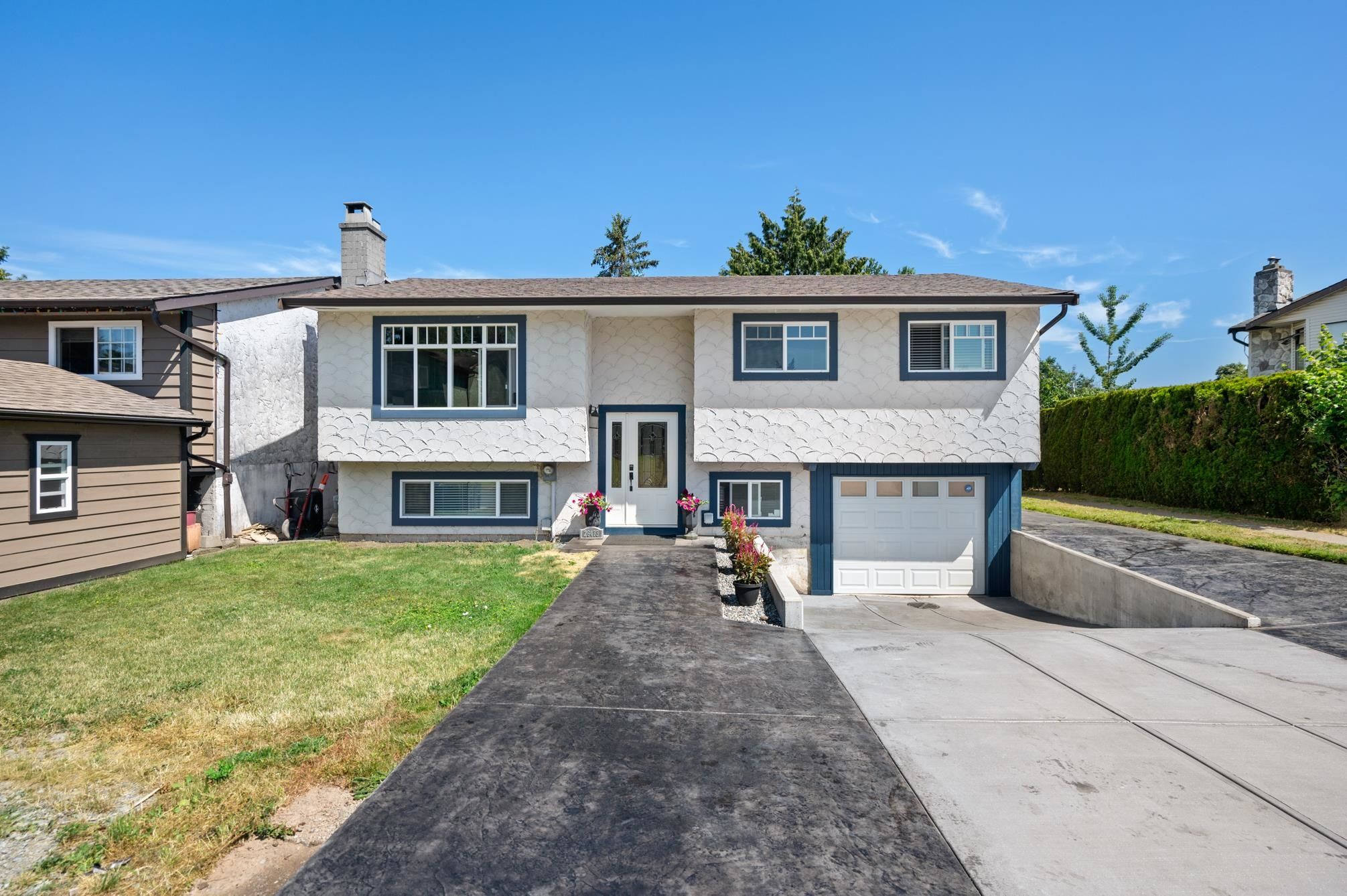 Main Photo: 26473 30A Avenue in Langley: Aldergrove Langley House for sale : MLS®# R2724669