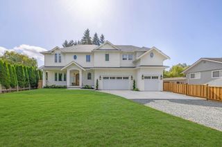 Photo 1: 21626 18 Avenue in Langley: Campbell Valley House for sale : MLS®# R2815411