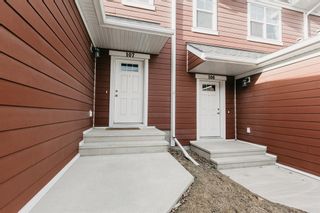 Photo 2: 107 881 Sage Valley Boulevard NW in Calgary: Sage Hill Row/Townhouse for sale : MLS®# A1242455