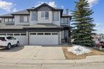 Main Photo: 3 Cougar Ridge Bay SW in Calgary: Cougar Ridge Semi Detached (Half Duplex) for sale : MLS®# A2121238