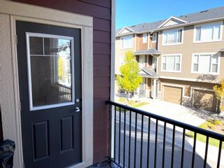 Photo 10: 218 Panatella Walk NW in Calgary: Panorama Hills Row/Townhouse for sale : MLS®# A2014681