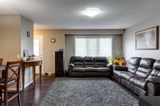 Photo 3: 1385 Windstone Road SW: Airdrie Row/Townhouse for sale : MLS®# A1229038