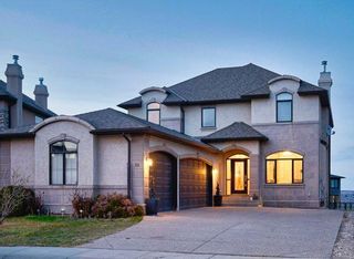 Photo 1: 36 Coulee Park SW in Calgary: Cougar Ridge Detached for sale : MLS®# A2127354