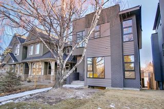 Photo 1: 6 Rosetree Crescent NW in Calgary: Rosemont Detached for sale : MLS®# A1039088