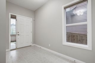 Photo 2: 74 Evansfield Park NW in Calgary: Evanston House for sale : MLS®# C4187281