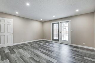 Photo 5: 4403 Bow Trail SW in Calgary: Rosscarrock Row/Townhouse for sale : MLS®# A2022311