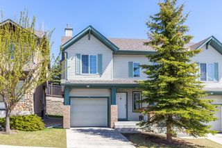 Photo 1: 85 Hidden Creek Rise NW in Calgary: Hidden Valley Row/Townhouse for sale : MLS®# A1104213