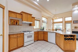 Photo 11: 162 Strathridge Close SW in Calgary: Strathcona Park Detached for sale : MLS®# A2046789