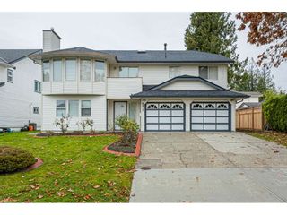 Photo 1: 6017 189 Street in Surrey: Cloverdale BC House for sale in "CLOVERHILL" (Cloverdale)  : MLS®# R2516494