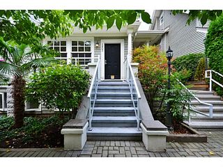 Photo 1: 1803 NAPIER Street in Vancouver: Grandview VE Townhouse for sale in "Salsbury Heights" (Vancouver East)  : MLS®# V1046669