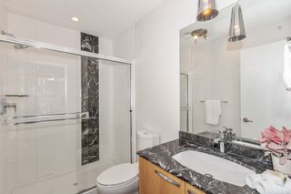 Photo 19: 413 733 W 14TH Street in North Vancouver: Mosquito Creek Condo for sale in "Remix" : MLS®# R2680600