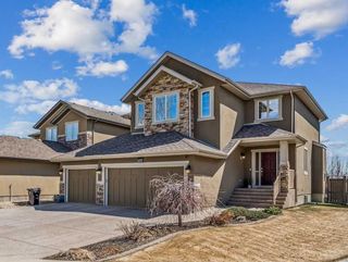 Main Photo: 137 Rockcliff Bay NW in Calgary: Rocky Ridge Detached for sale : MLS®# A2130194