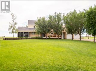 Photo 1: 221 Falcon Ridge Way in Rural Lethbridge County: House for sale : MLS®# A2016940