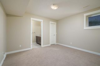Photo 21: 722 56 Avenue SW in Calgary: Windsor Park Row/Townhouse for sale : MLS®# A1020099