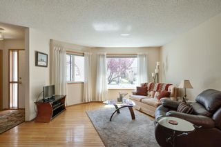 Photo 6: 21 Sandarac Circle NW in Calgary: Sandstone Valley Row/Townhouse for sale : MLS®# A2048786