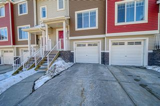 Photo 1: 555 Panatella Boulevard NW in Calgary: Panorama Hills Row/Townhouse for sale : MLS®# A2034434