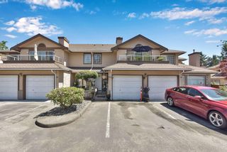 Photo 1: 220 14861 98 AVENUE Avenue in Surrey: Guildford Townhouse for sale in "The Mansions" (North Surrey)  : MLS®# R2703530