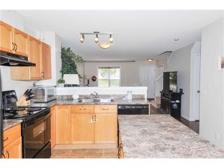 Photo 10: 318 TOSCANA Gardens NW in Calgary: Tuscany House for sale : MLS®# C4116517