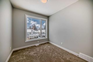 Photo 31: 408 Shawnee Square SW in Calgary: Shawnee Slopes Row/Townhouse for sale : MLS®# A2117182