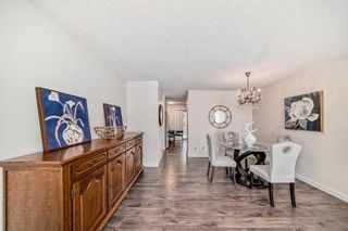 Photo 7: 59 Sandarac Circle NW in Calgary: Sandstone Valley Row/Townhouse for sale : MLS®# A2116581