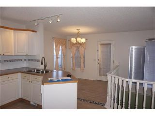 Photo 5: 208 TARINGTON Close NE in Calgary: Taradale House for sale : MLS®# C4040082