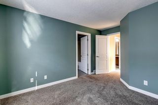 Photo 15: 101 Panatella Road NW in Calgary: Panorama Hills Row/Townhouse for sale : MLS®# A2030502