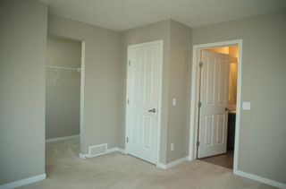 Photo 11: 668 Copperpond Boulevard SE in Calgary: Copperfield Row/Townhouse for sale : MLS®# A1242943