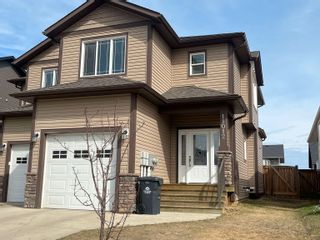 Photo 3: 11012 104A Avenue in Fort St. John: Fort St. John - City NW 1/2 Duplex for sale : MLS®# R2750586