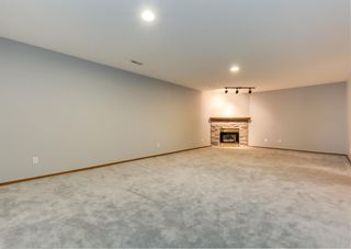 Photo 25: 20 Arbour Cliff Close NW in Calgary: Arbour Lake Semi Detached for sale : MLS®# A1216259
