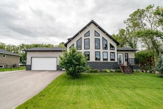 Photo 1: 2125 ASH Lane in Ile Des Chenes: R07 Residential for sale : MLS®# 202218854