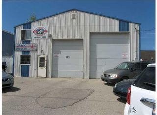 Photo 1: 129 FISHER Avenue: Cochrane Industrial for lease : MLS®# A1255452