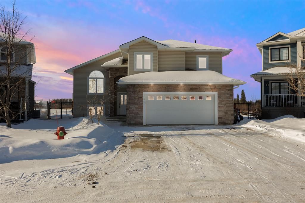 Welcome to 245 Walnut Crescent with double attached garage and backing onto greenbelt