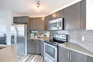 Photo 10: 172 Sunvalley Road: Cochrane Row/Townhouse for sale : MLS®# A1209421