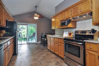 Photo 1: 225 5641 201 Street in Langley: Langley City Townhouse for sale in "The Huntington" : MLS®# R2473475