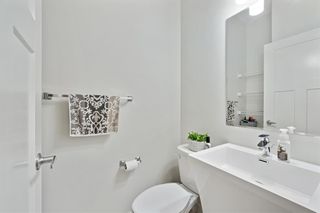 Photo 12: 562 Evanston Manor NW in Calgary: Evanston Row/Townhouse for sale : MLS®# A2051331