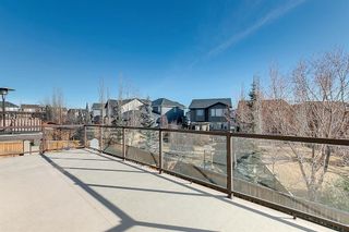 Photo 10: 1544 93 Street SW in Calgary: Aspen Woods Detached for sale : MLS®# A1181442