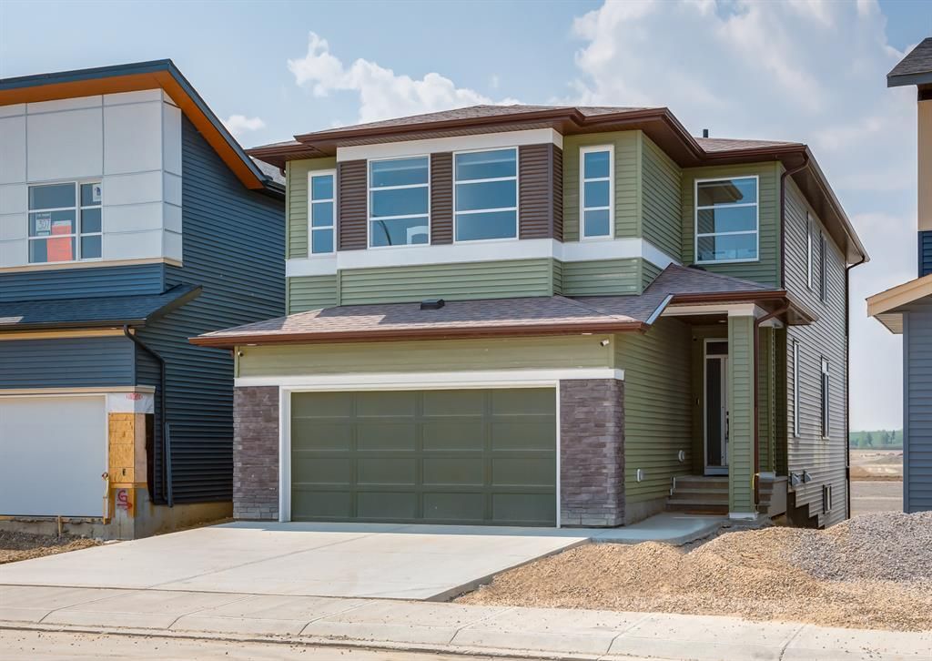Main Photo: 311 Lucas Way NW in Calgary: Livingston Detached for sale : MLS®# A2049804