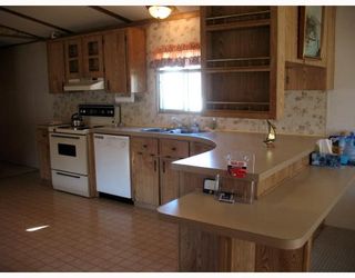 Photo 6: 83 145 KING EDWARD Street in Coquitlam: Maillardville Manufactured Home for sale in "MILL CREEK VILLAGE" : MLS®# V780191